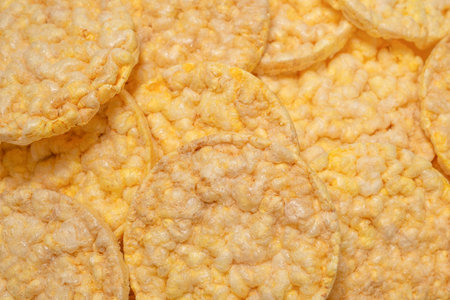 Rice wafers background, top view.