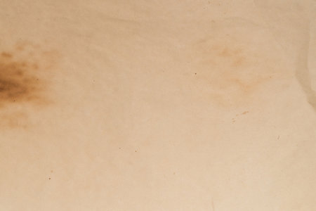 Old crumpled beige paper background.の写真素材