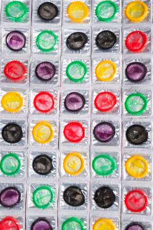Colorful condoms background. Top view.の写真素材
