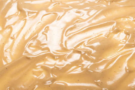 Mushroom sauce as a background. Top view.