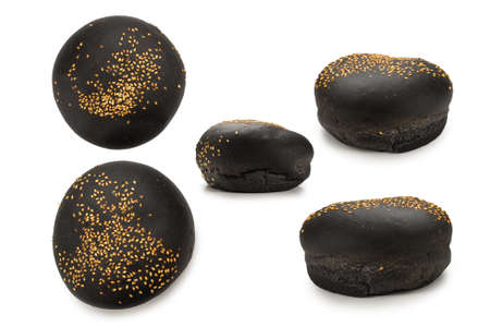 Black burger bread isolated on white background.の写真素材