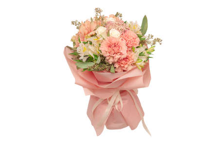 Bouquet of soft pink flowers in pink wrapping paper.の写真素材