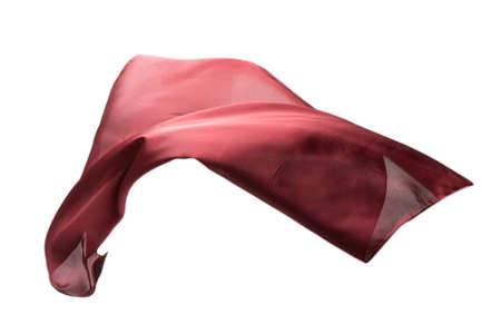 Flowing red silk scarf isolated on white background.の写真素材