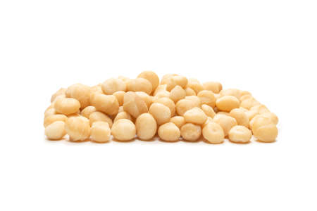 Macadamia nuts isolated on white background. Top view.の写真素材