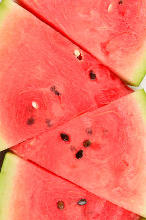 Juicy watermelon slices background. Top view.の写真素材