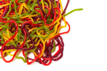 Tasty jelly spaghetti isolated on white background. Candy stripes.の写真素材