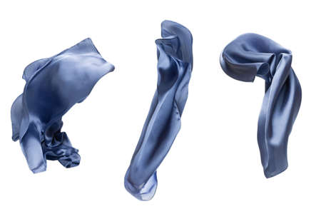 Flowing blue silk scarf isolated on white background.の写真素材