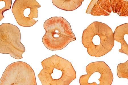 Dried fruit isolated on white background. Dried grapefruit, dried apple, dried pear slices.
