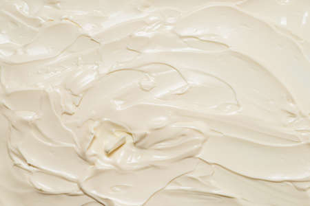 White whipped cream texture. Top view.