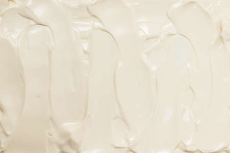 White whipped cream texture. Top view.