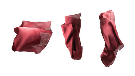 Flowing red silk scarf isolated on white background.の写真素材
