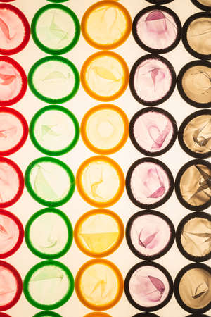 Colorful condoms background. Top view.の写真素材