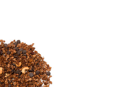 Chocolate granola cereal with nuts. Isolated on white bacckground.の写真素材