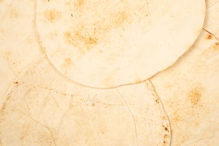 Grilled pitta bread isolated on white background. Top view.