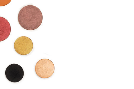 Round multicolored make up eyeshadows isolated on white. Top view.の写真素材
