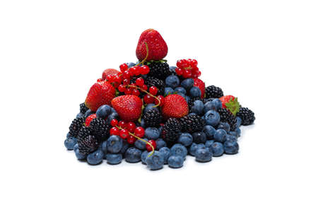 Blackberry, raspberry, blueberry, red currant isolated on a white background. Top view.の写真素材