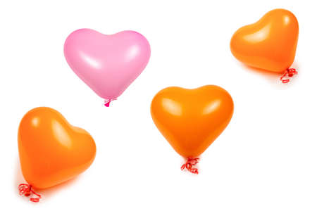 Orange heart ballon isolated on white background. Copy space.の写真素材