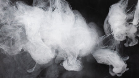 White steam on a black background. Copy space.の写真素材