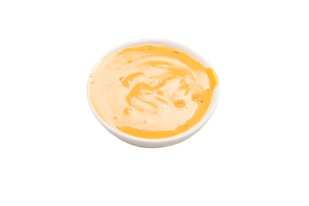 Sauce in a bowl isolated on white background. Top view.の写真素材