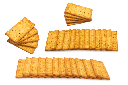 Cracker with salt isolated on white. Top view.