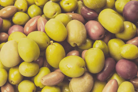 Tasty mix olives background. Top view.の写真素材