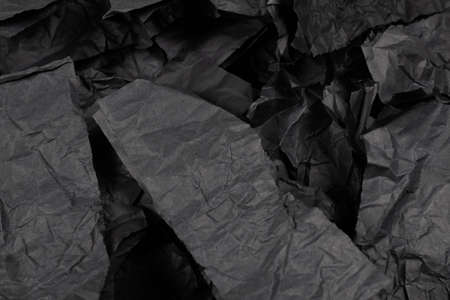Abstract black paper texture background. Top view. Copy space.の写真素材