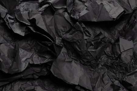 Abstract black paper texture background. Top view. Copy space.の写真素材
