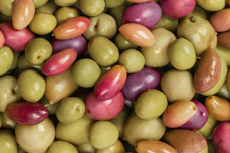 Tasty mix olives background. Top view.の写真素材