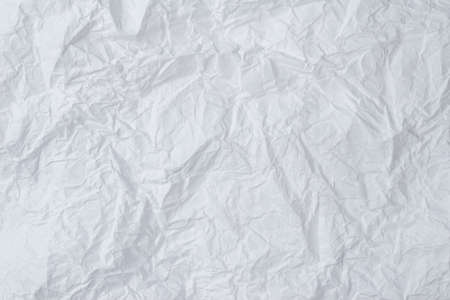 Crumpled white paper background. Top view. Copy space.の写真素材