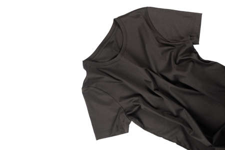 A black cotton t shirt isolated on a white background.