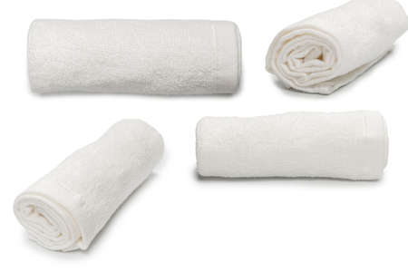 White fluffy cotton towel isolated on a white background. Spa and resort.の写真素材