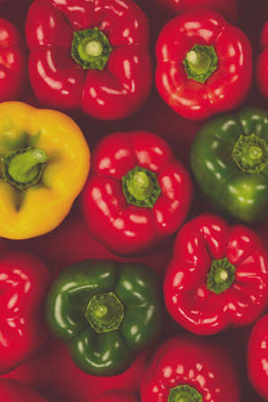 Fresh red, green, yellow bell pepper background.の写真素材