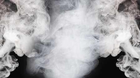 White steam on a black background. Copy space.の写真素材