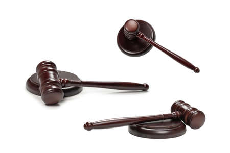 Wooden judge gavel and soundboard isolated on a white background. Justice of law system conceptual.