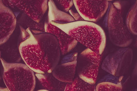 Tasty figs background. Top view. Slices.の写真素材