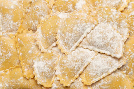 Raw ravioli as a background. Healthy italian food.の写真素材