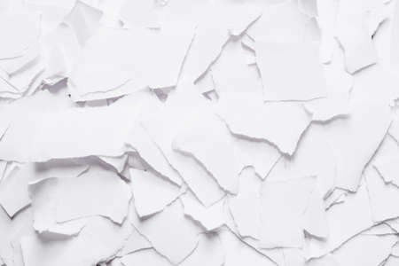 Empty white paper pieces as a background. Space for text or design.の写真素材