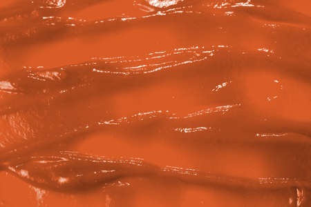 Red sauce splashes as background.の写真素材