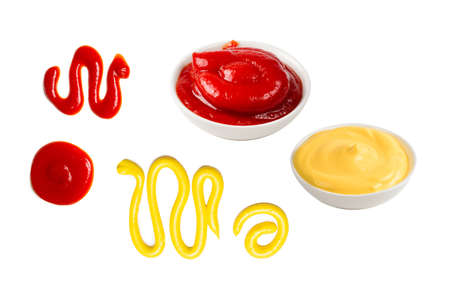 Ketchup and yellow sauce splashes isolated on white background.の写真素材
