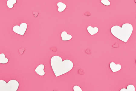 Red and white hearts on a red background.