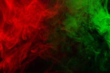 Red steam on a black background. Copy space.の写真素材