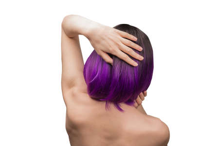 Woman backside, beautiful woman with purple hair isolated on a white background.の写真素材