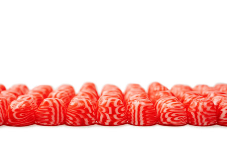 Red round tasty gummy candies islolated on a white background.の写真素材