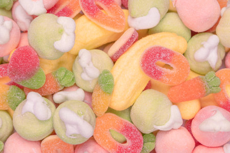 Mix of jelly colorful candy and marshmallows as a background.