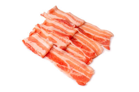 Raw bacon slices isolated on a white background. Top view.の写真素材