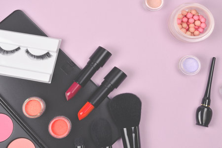 Professional makeup products with cosmetic beauty products, blushes, eye liner, eye lashes, brushes and tools.の写真素材