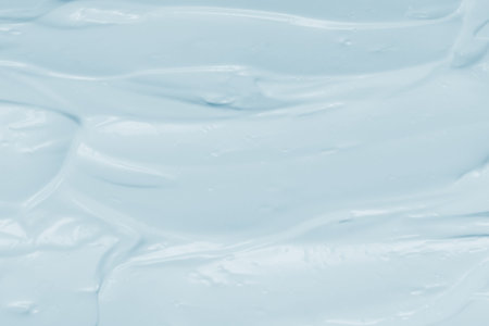 White whipped cream texture. Top view.