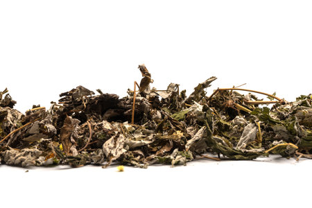 Dry tea leaves and dry fruits isolated on a white background.の写真素材