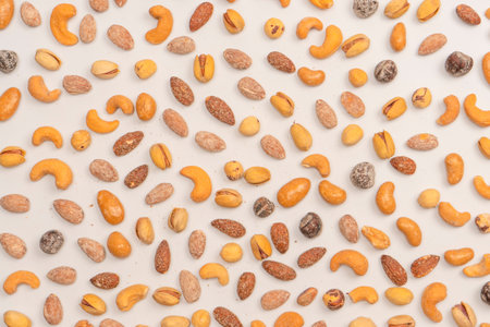 Mix of tasty salty nuts. A group of almonds, pistachios, walnuts, macadamia, cashews.の写真素材