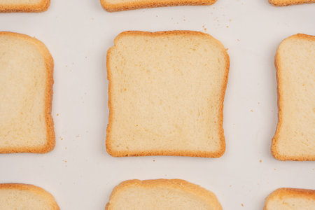 Delicious bread slices isolated on a white background, top view.の写真素材